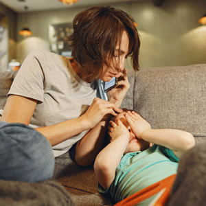 mother on phone with child